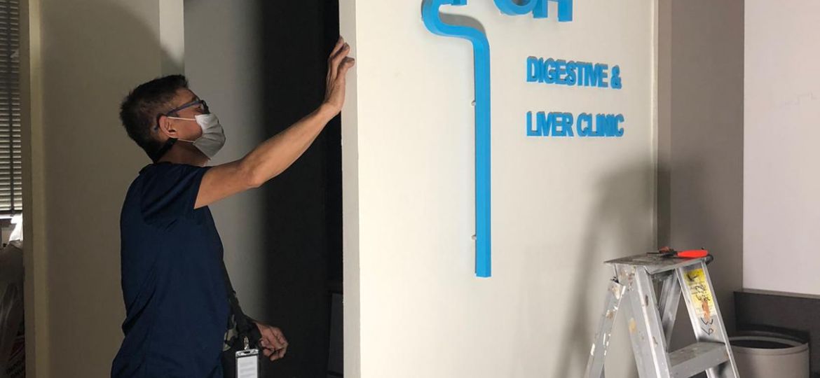 3d acrylic signage installation for ch Poh digestive clinic in singapore