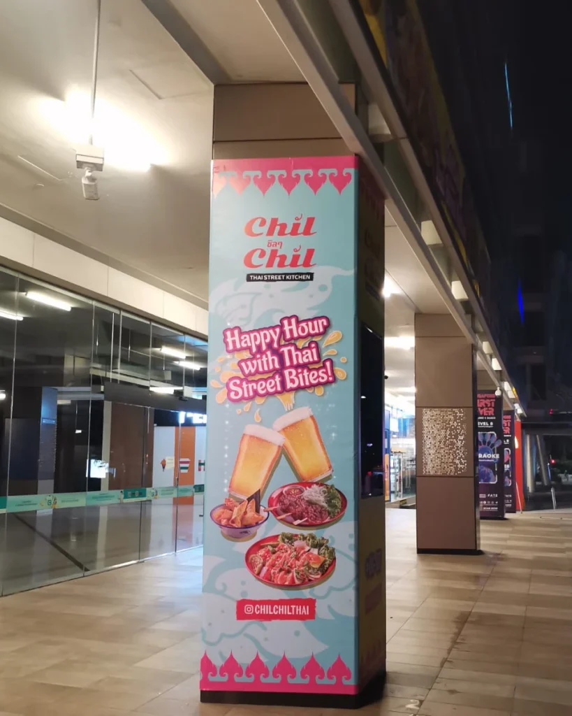 Pillar wrap signage for Chil Chil promoting Happy Hour and Thai street bites