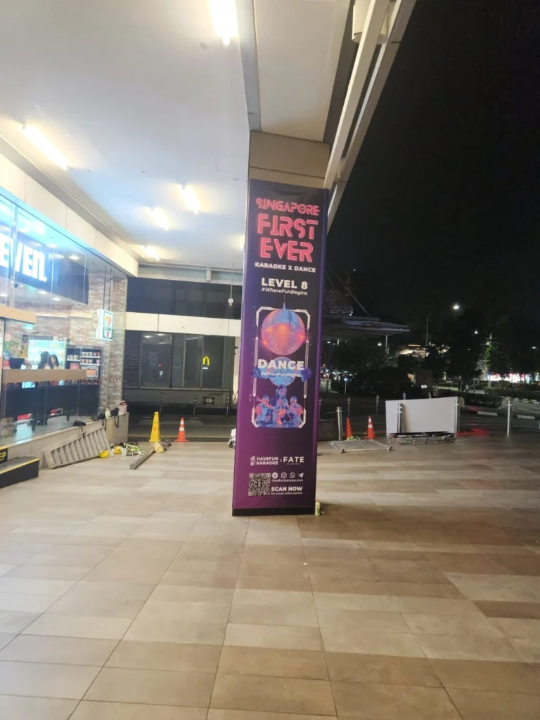 A pillar banner created for the "Singapore's First Karaoke X Dance Level 8" even