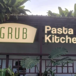 An illuminated outdoor storefront sign and 3D lettering for Grub Pasta Kitchen